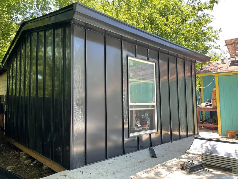 Black standing seam metal wall panels for Roof Inspection in Bright