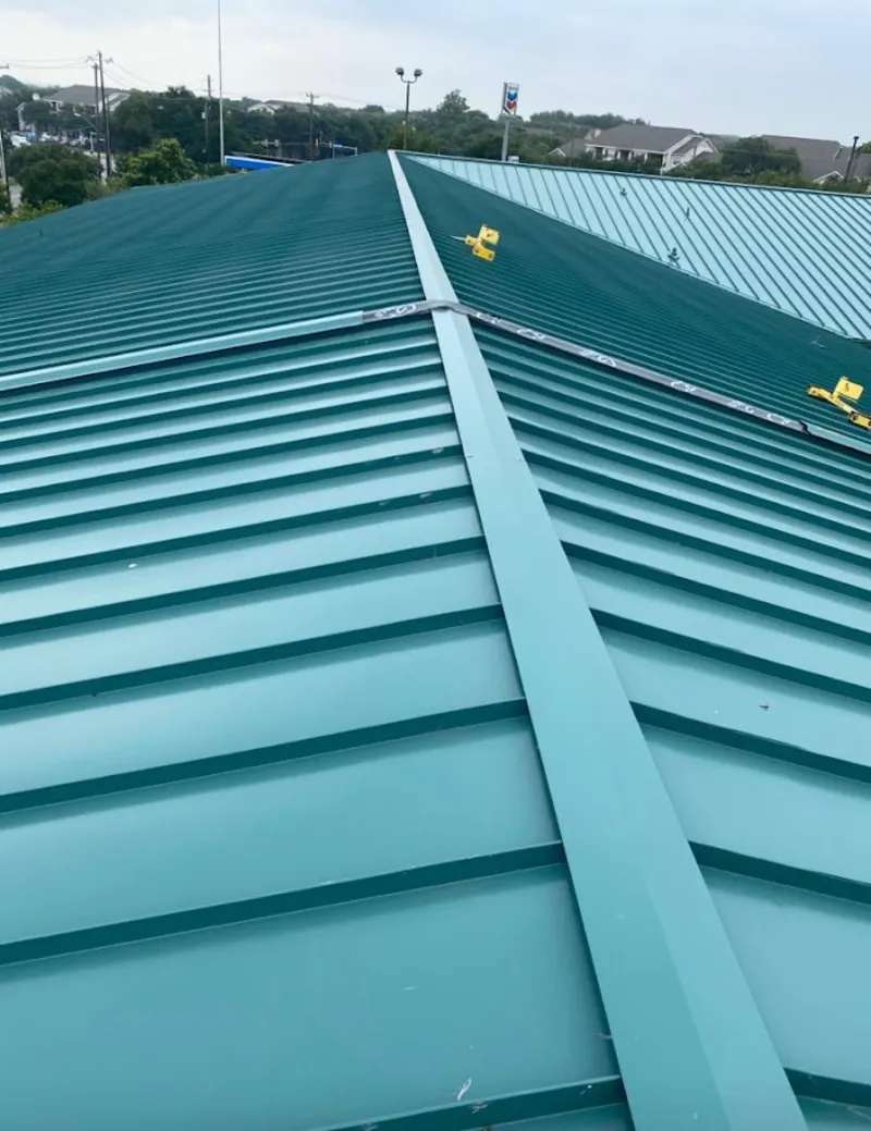 Green commercial metal roof ridge and valley for Metal Roof Repair in Bright